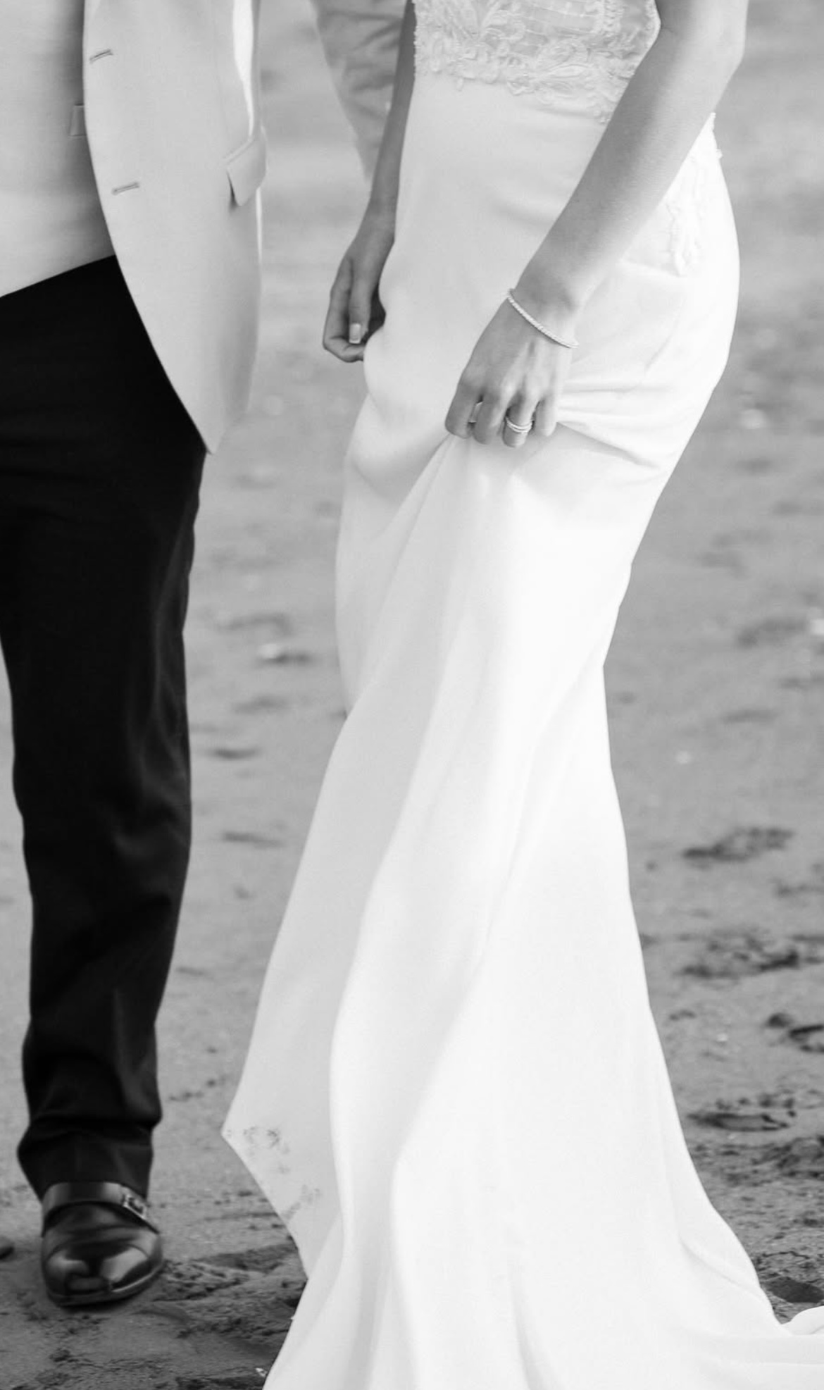 Bride holding her dress