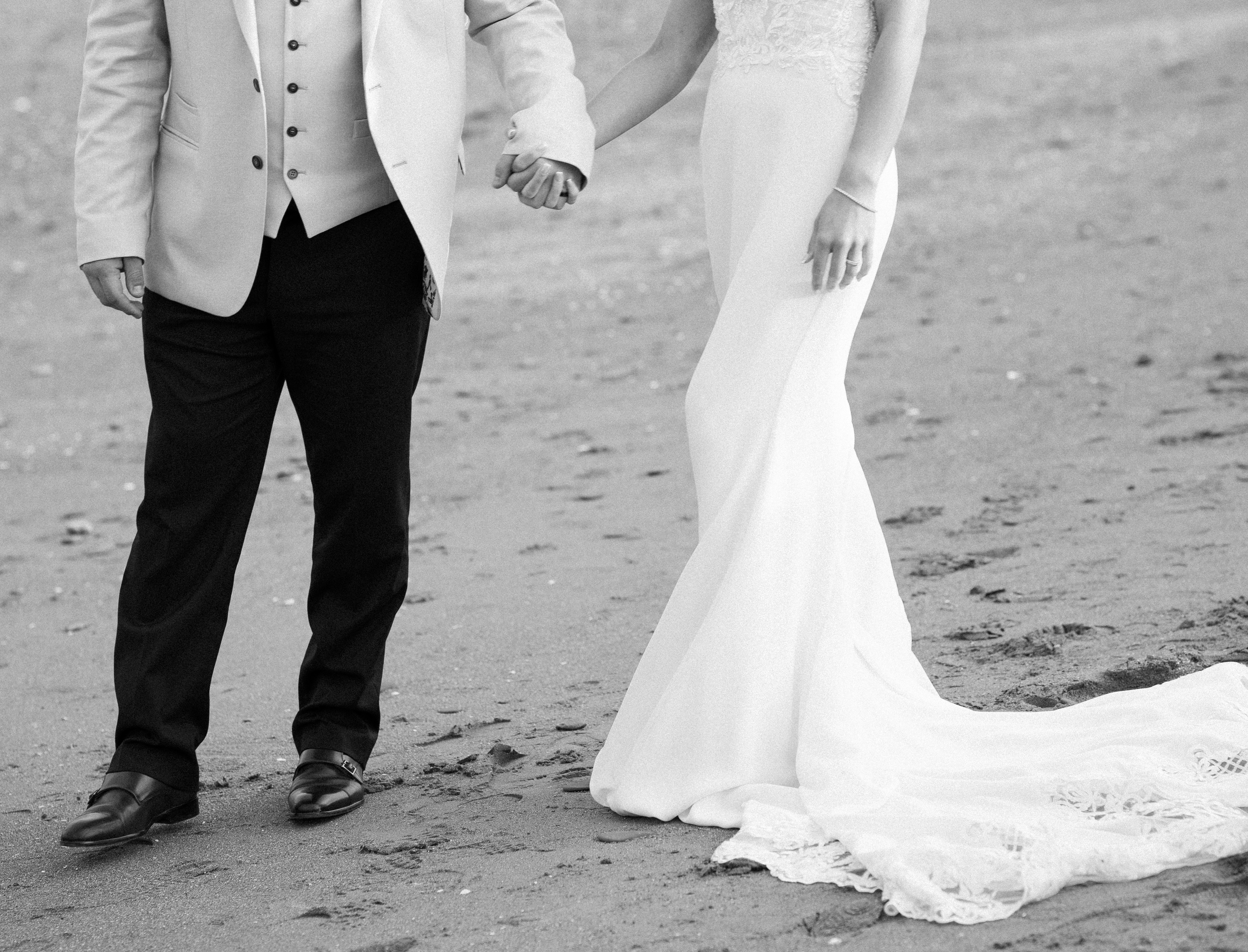 Wedding couple walking on a beach